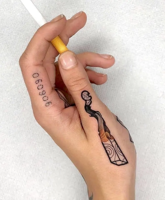 Cigarette Thumb Tattoo